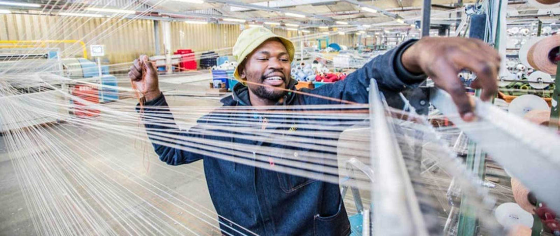 A person is making wool blanket